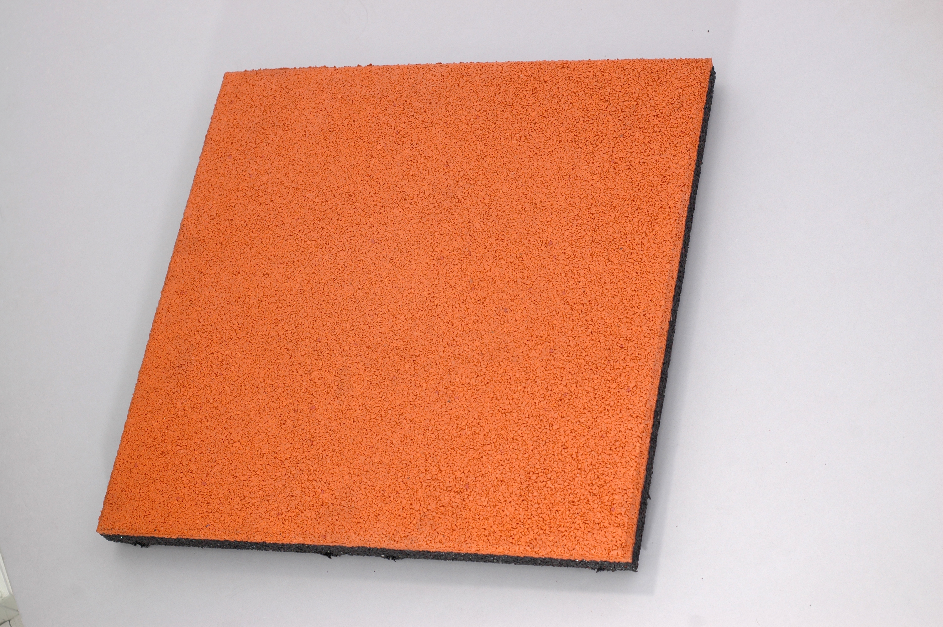 Orange elastic tile