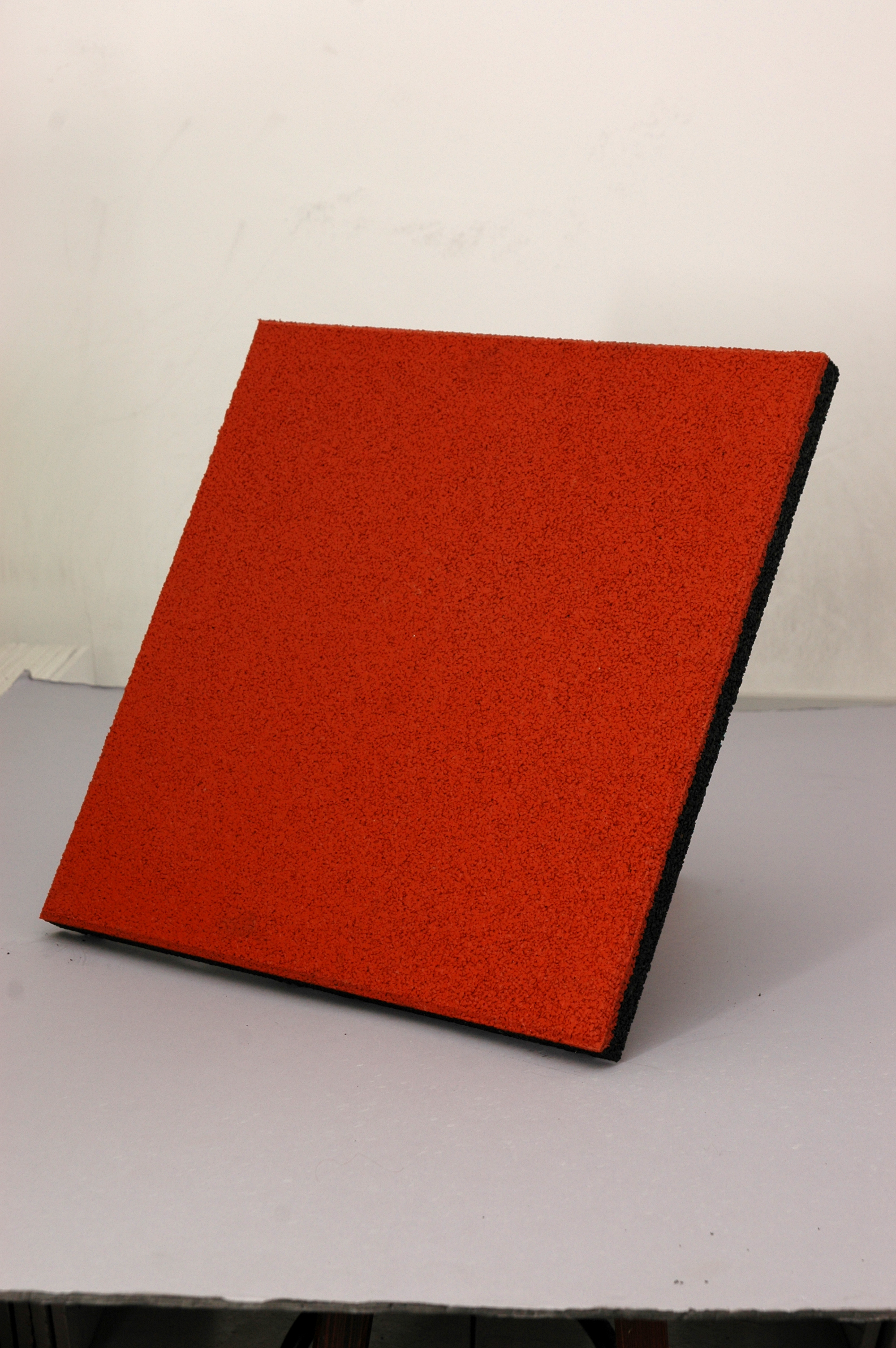 Red elastic tile