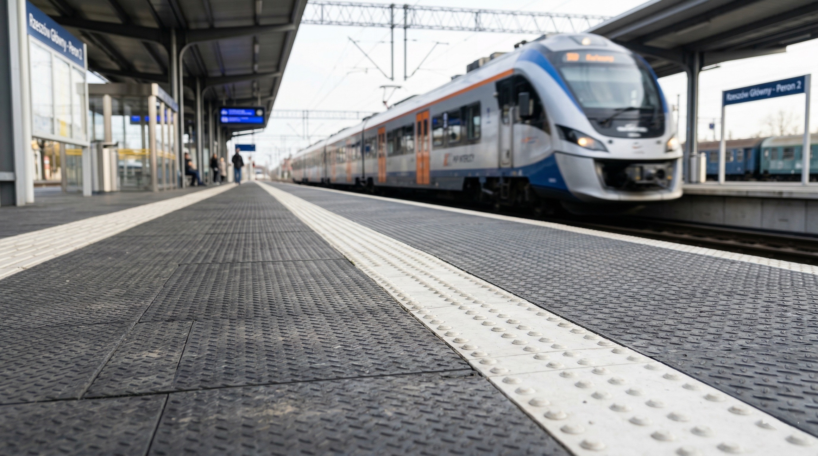 Textured rubber safety surface on train platform